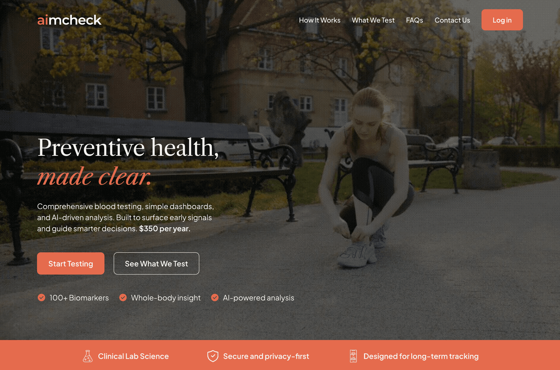AimCheck homepage: Preventive health, made clear, orange Start Testing CTA over photography, shown in browser and phone frames.